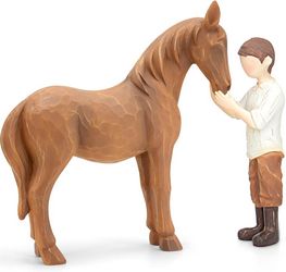 Cowboy Embraces Horse Figurine